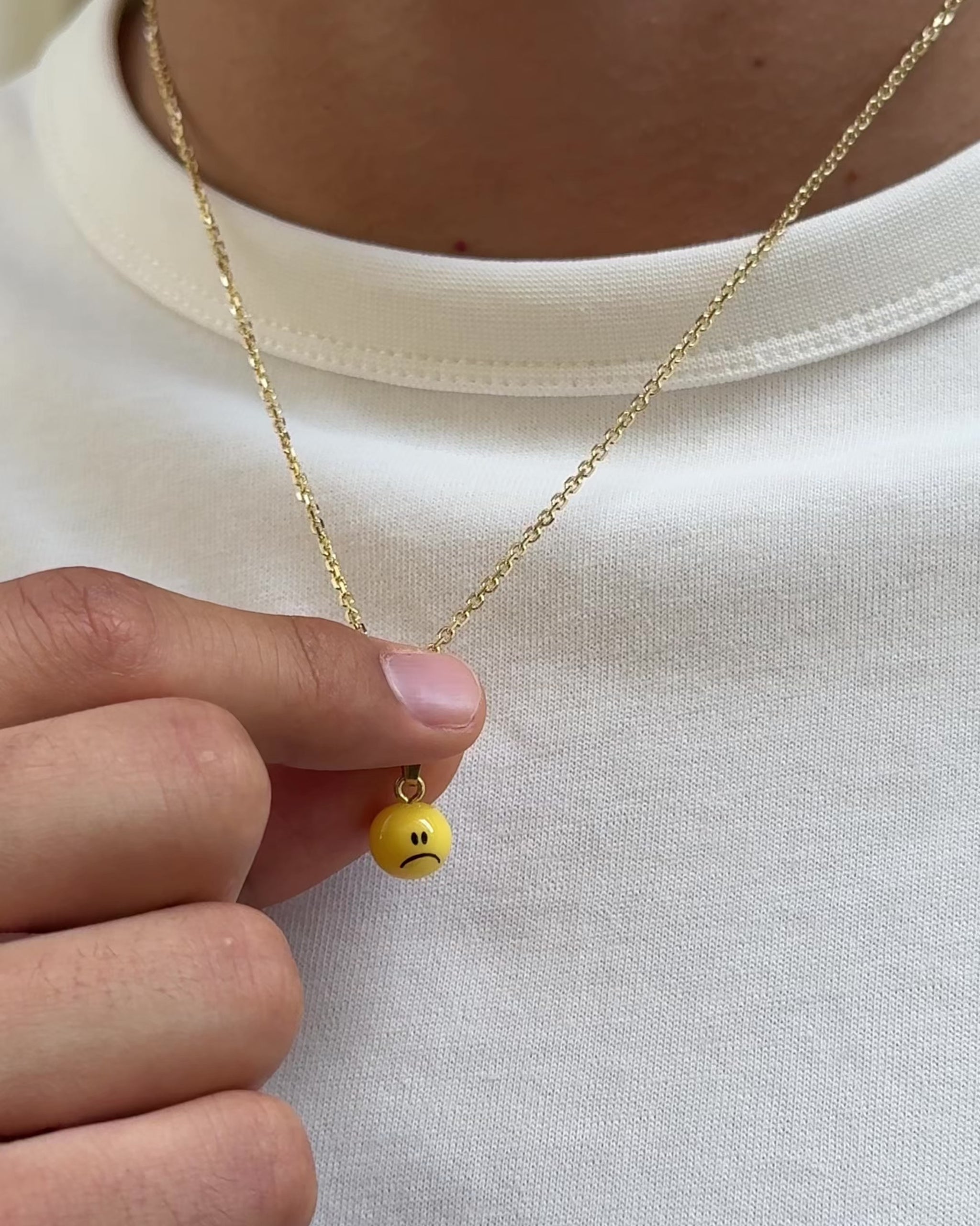 sad and happy smiley necklace